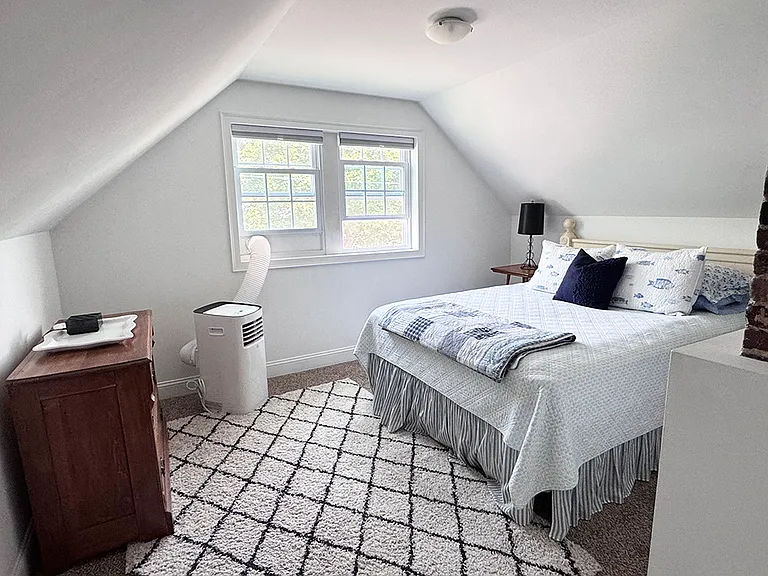 upper floor bedroom with ocean view.