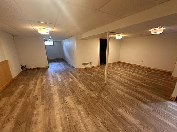 Basement with laundry and a 1/2 bath. Flooring is new!
