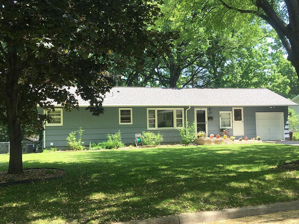 cute front garden with attached garage