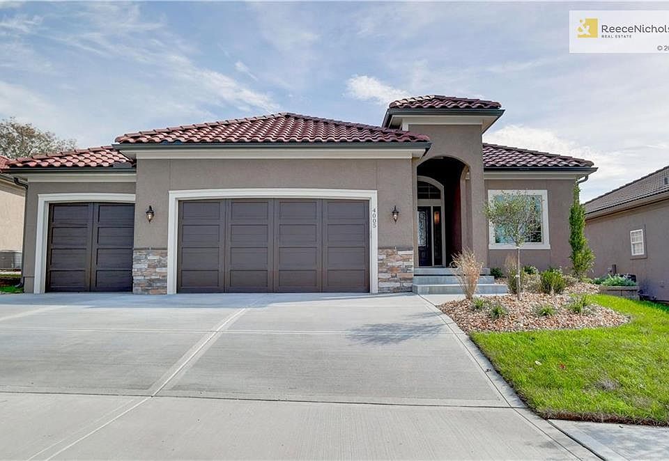 Ceramic tile roof by Crown Iberia and durable four-sided masonry stucco exterior. Cultured stone accents(per plan) with long lasting Sherwin Williams paint. Covered patio, sized per plan.