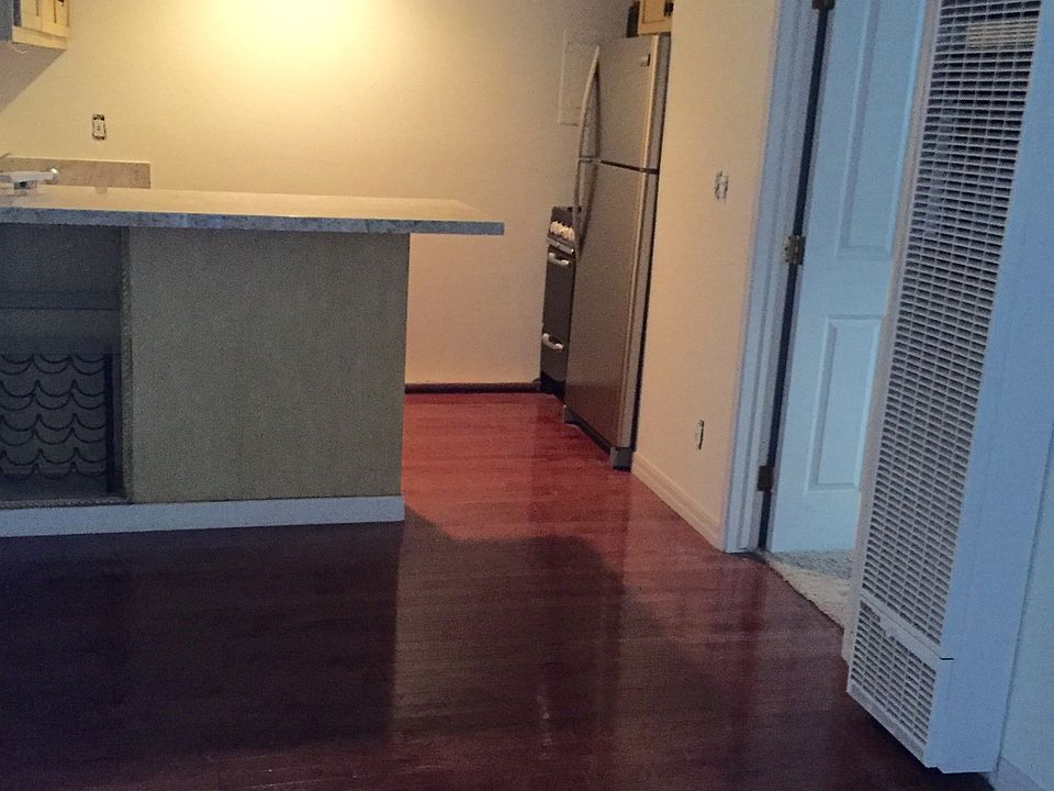 Spacious living room with Brazilian Cherry hardwood floors -