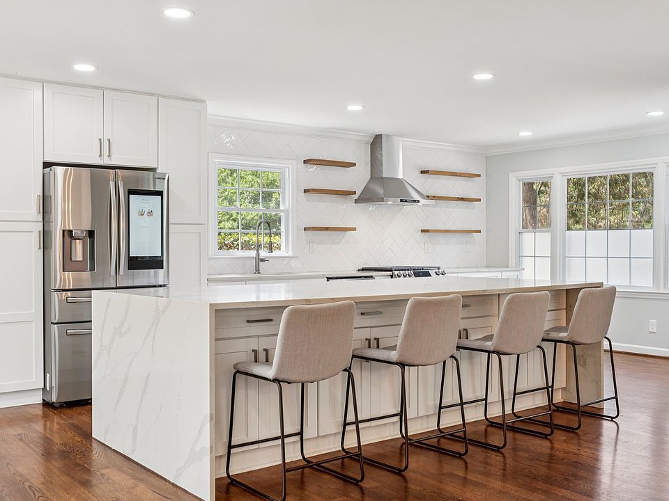 Gorgeous chef's kitchen with waterfall island.