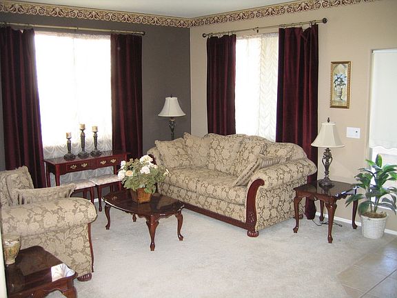 Formal Living Room : 2 large windows