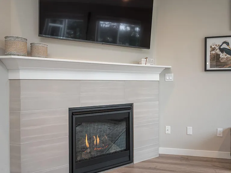 gas fireplace with fan to circulate heat
