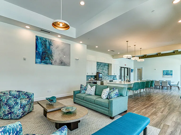 Imperial Crossing Luxury Apartment Homes community clubhouse seating area.