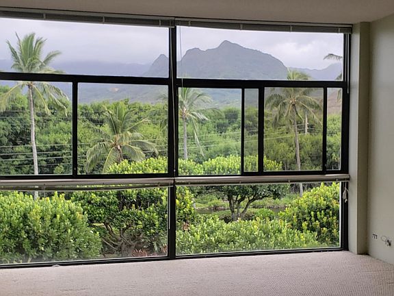 View standing further back into living room.