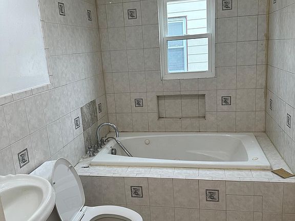 1 of 3 bathrooms