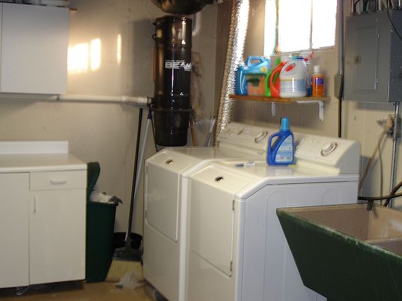 Laundry room area in basement