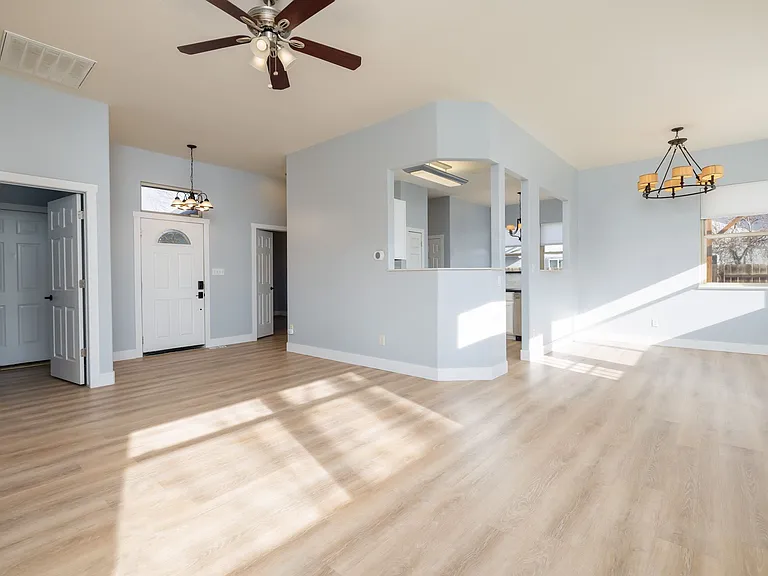 Laundry room and front door to the left, kitchen in the middle.