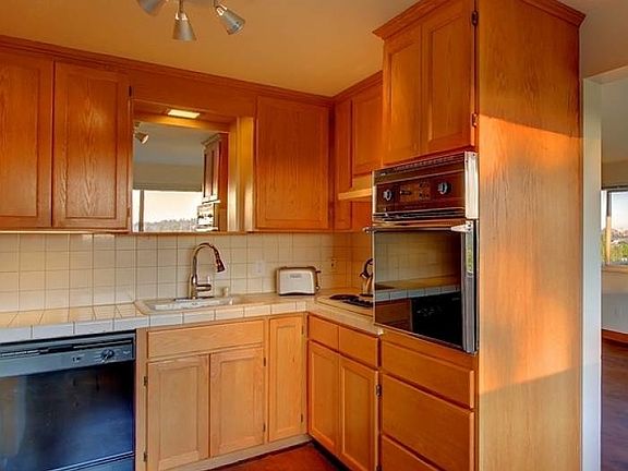 Kitchen opens to view