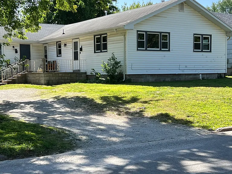 Street view with shared driveway.