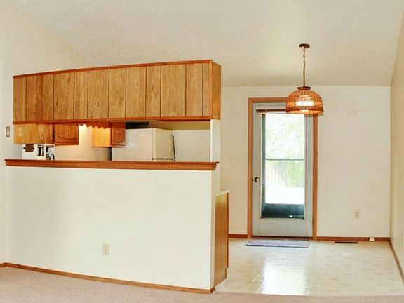 The Dining area is right off the kitchen and will fit a nice sized table. A step out the glass door 