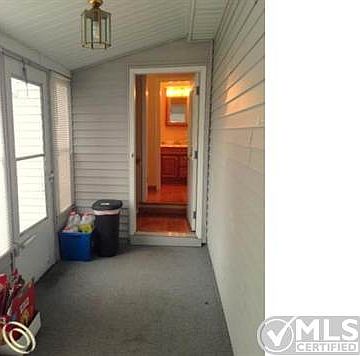 Breezway from home to garage.JPG