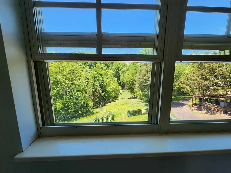View of back yard from the upstairs bathroom window