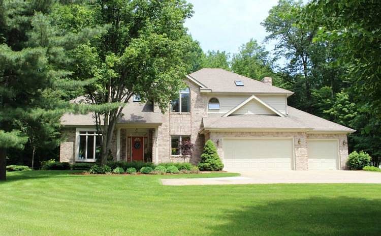 Exceptional One Owner Home in Whippoorwill Hollow! Meticulously maintained & recently updated, this home is ready for your family! Remodeled in 2015, the kitchen includes brand new granite countertops & stainless appliances, tile back splash and an 8 ft island! Easy open layout with large windows and fantastic views of the private setting from every window. Sun-filled kitchen, breakfast nook, & family room are open with access to the deck and lush landscaped yard! Spacious main floor family room features custom built-ins and fireplace. Formal living and dining room also feature large windows and fresh decor! Convenient main floor laundry/mudroom. All 4 bedrooms are spacious including master bedroom suite with oversized master bath, walk-in closet and skylight! Fresh interior paint throughout, and the exterior red wood was stained in 2014. Finished basement features a family room with egress window, bar, & half bath. Premier location in Larkin township with city water. Turn Key Home!