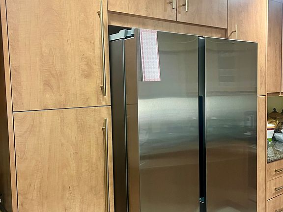 cabinet space and stainless steel refrigerator
