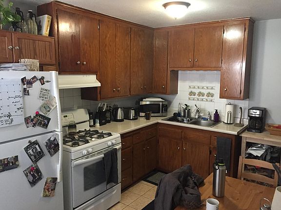 Kitchen has a new fridge and gas range. Room for a small table.