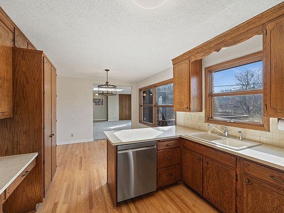 Open Kitchen has a real oak floor and lot's of cabinetry
