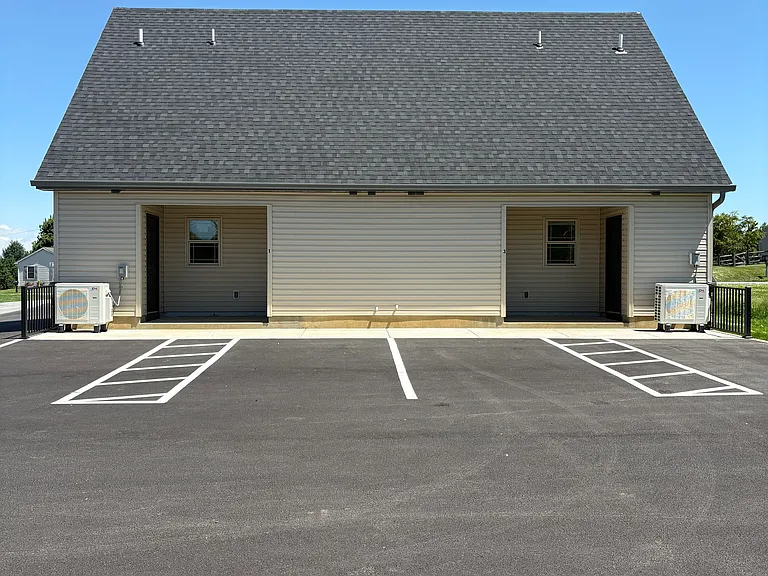 Back of unit, parking lot
