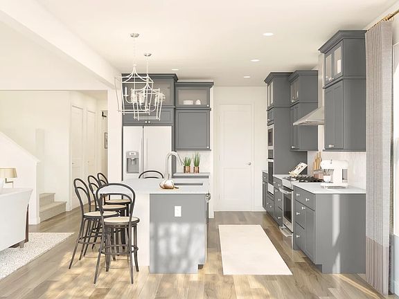 Kitchen with glass upper cabinets