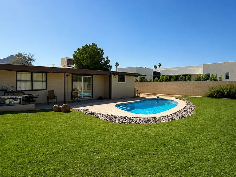 your private pool and backyard