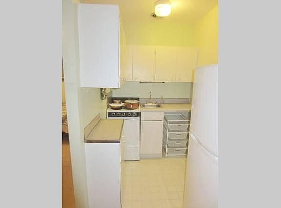 The kitchen comes with pots and pans