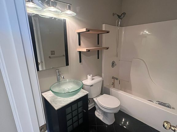 Full Bathroom accessible by Bedroom#1 and Hallway