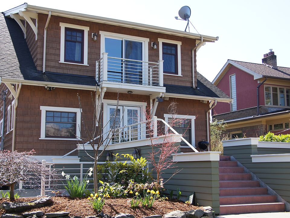 back of house - deck on top of garage and balcony