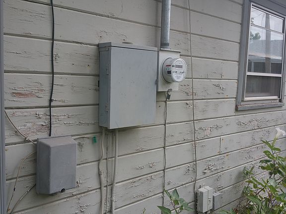 Back of home where utility 