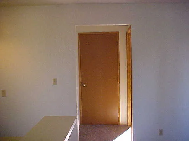 DINING AREA ON LEFT, HALLWAY TO BATHROOM AND BEDROOM, CLOSET SPACE