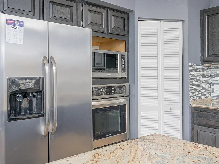 Stainless steel appliances, Refrigerator, microwave and oven
