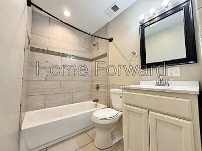 5th image of 212 E 7th St