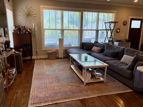 Large living area - couch can be in the center of the room or against the window for a more open layout. *NOTE: house comes unfurnished (pics show current owner's furnishings that will be moved).*