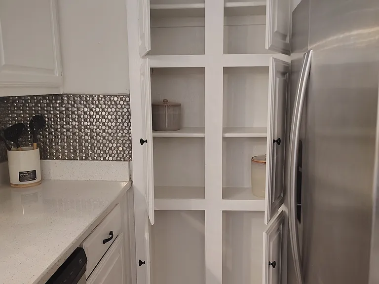 Pantry and many cabinets up and down!