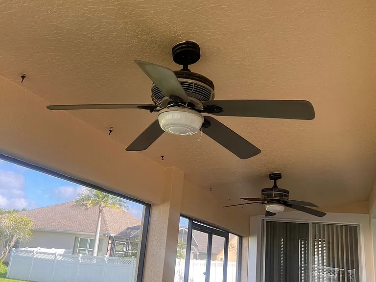 47 - Ceiling fans in the patio for outdoor comfort year-round.