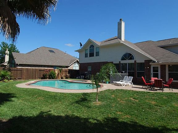 CHECK OUT THIS SPACE! POOL WITH PLENTY OF EXTRA YARD.
