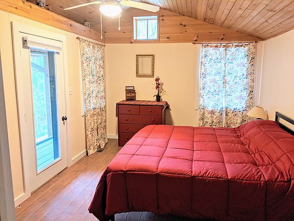 Main bedroom with private screened porch