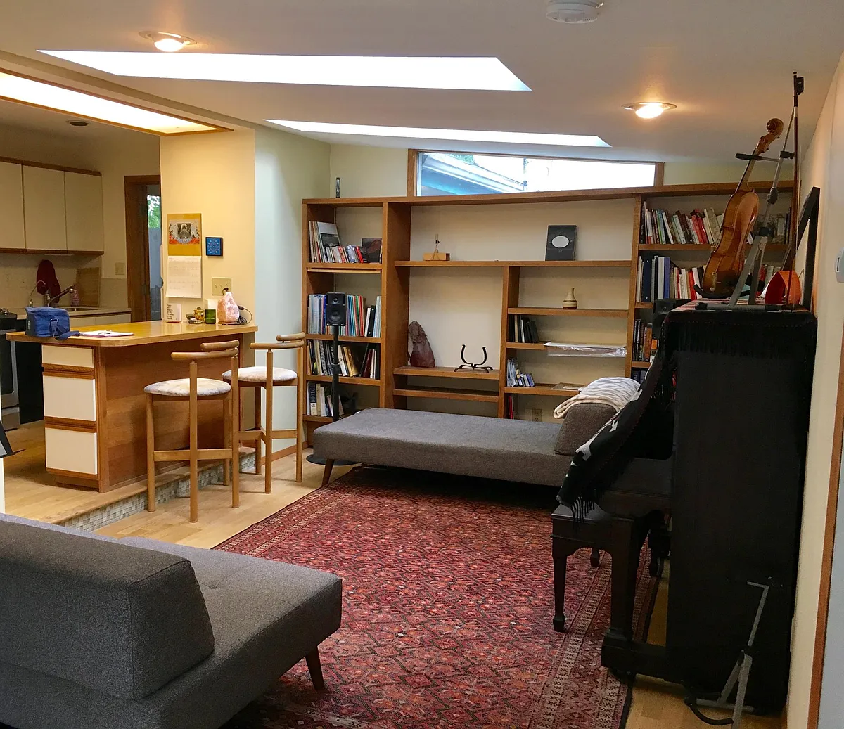 Living room with built-ins and skylights. - 3232 6th St