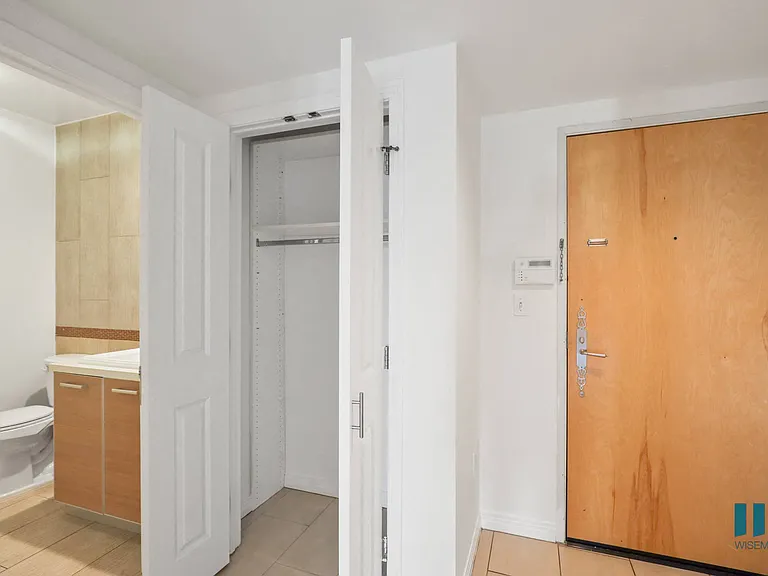 Front Entrance of Apartment, Hall Closet, and Bathroom