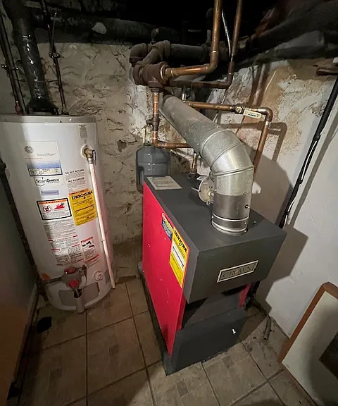Water tank and gas furnace