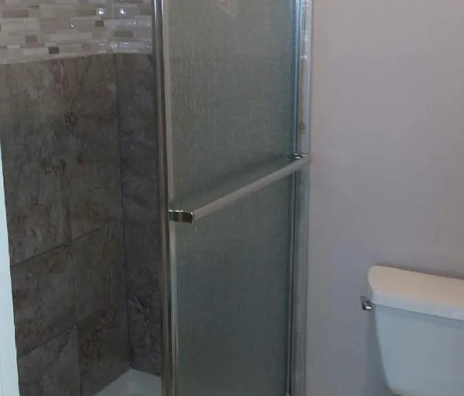Primary Bedroom/Bathroom walk in tile shower
