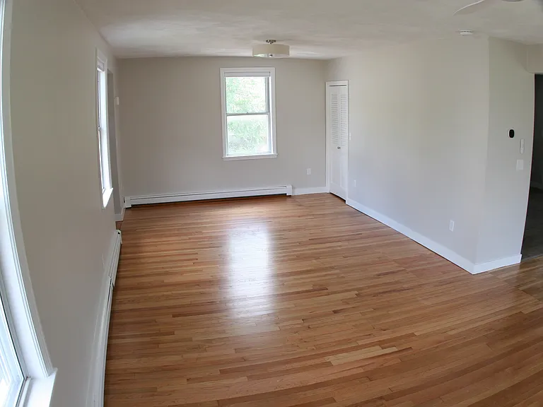 Living Room with Coat Closet