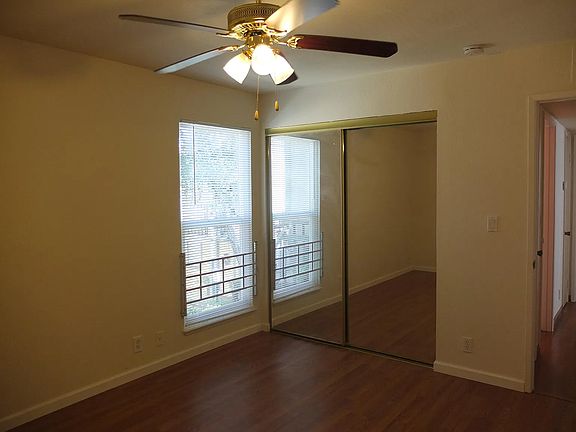Bedroom#1 with closet behind the mirror