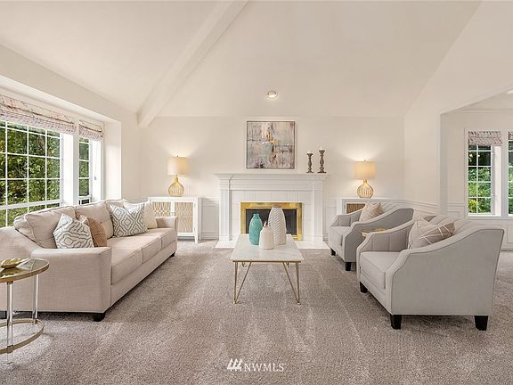 Light Filled Living Room With Gas Fireplace