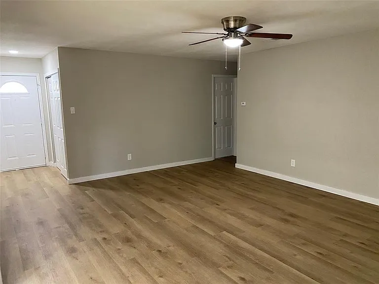 Living area looking toward entry and hallway