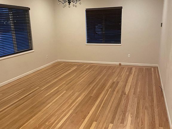 Large living room with lots of natural light