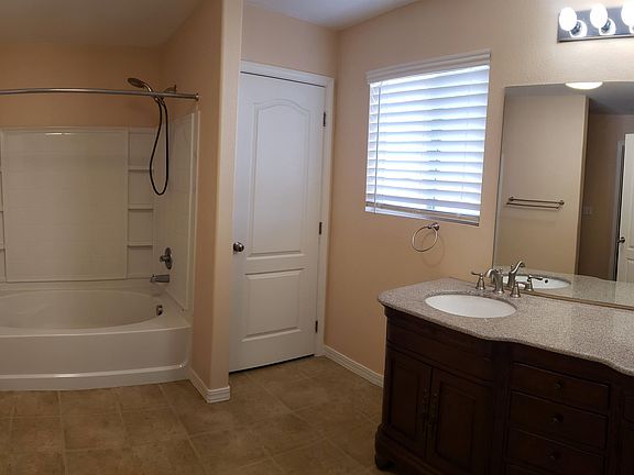 Master Bath
Dual Sink Granite Vanity, Lg Garden tub, Linen Closet, Lg closets to L & R sides of pic.