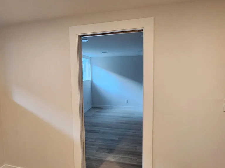 One bedroom leading to main living space