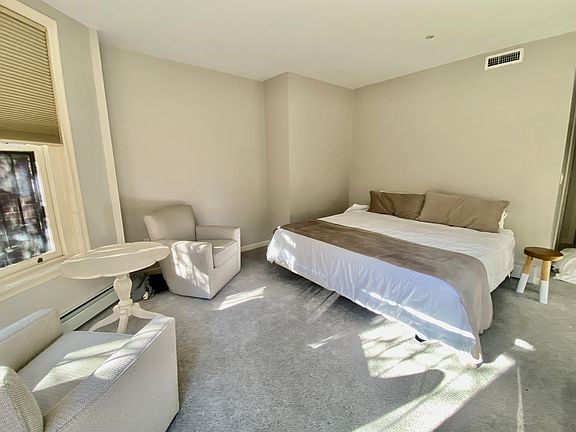 Primary bedroom with king size bed.