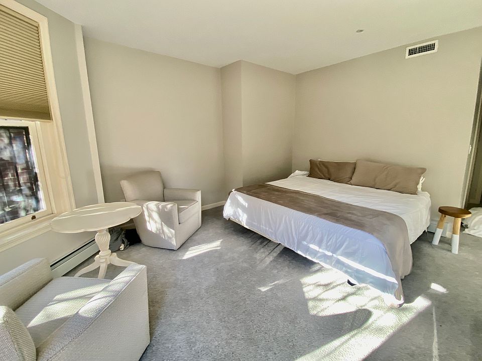 Primary bedroom with king size bed.